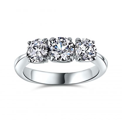 ROUND BRILLIANT THREE STONE TRILOGY RING