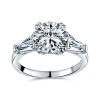 ROUND BRILLIANT CENTER WITH BAGUETTE RING